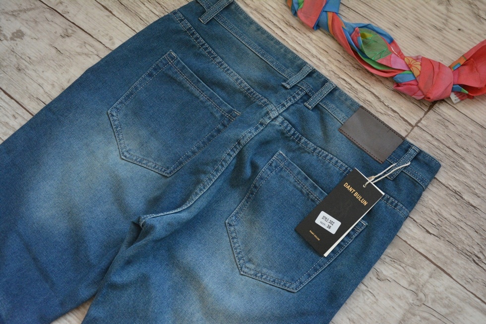 Męskie spodnie jeansowe z przetarciami - obrazek 6