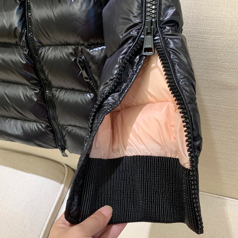 Puchowa damska kurtka z rozsuwanymi rękawami - obrazek 2