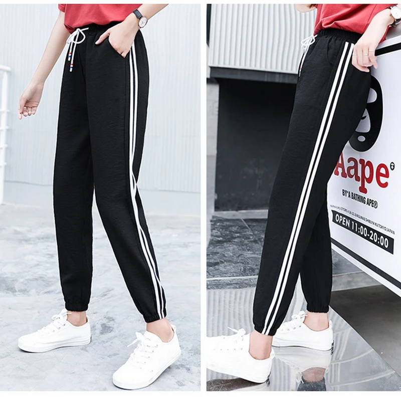 Damskie dresy z paskami - obrazek 4