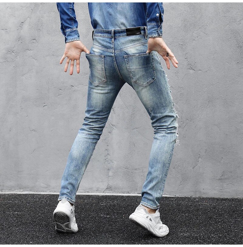 Męskie jeansowe proste spodnie z dziurami - obrazek 4