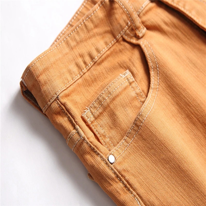 Męskie spodnie slim z przetarciami - obrazek 5