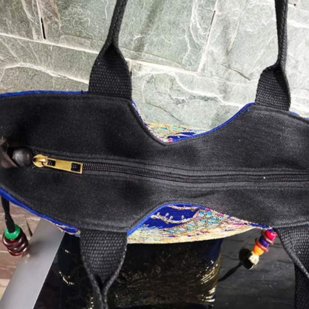 Damska torebka haftowana z błyszczącym Pawiem - obrazek 4